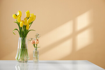 A cozy home with sunlight shining through the
windows and fresh flowers