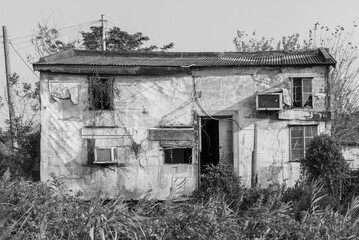 Fototapeta na wymiar Abandoned residential house in rural area of Hong Kong city
