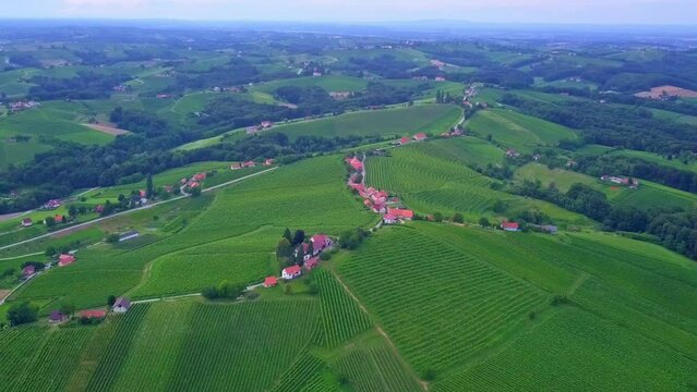 Aerial drone 4K footage of Prlekija which is a picturesque region in northeastern Slovenia known for its rolling hills, lush vineyards, and rich cultural heritage.
