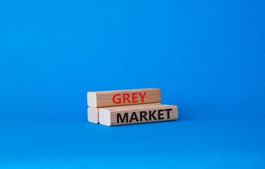 Do grey market. Wooden blocks with words grey market. Beautiful blue background. Business and grey market concept. Copy space.