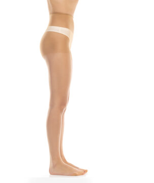 Woman wearing tights isolated on white, closeup of legs on a white background. Profile, side view