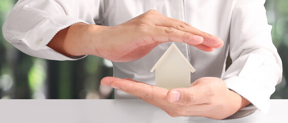 Obraz premium House Residential Structure in hand ,business home idea