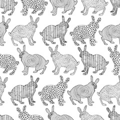 Cute rabbits on white. Naive art. Seamless vector pattern.  Cartoon animal background. Perfect for wallpaper, wrapping, fabric and textile.