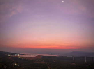 aerial view wind turbine viewpoint at Lamtakong dam,Nakhonratchasima, Thailand.
amazing sky of sunset above Lamtakong dam beautiful reflection on the large pond.
Gradient color. Sky texture, 