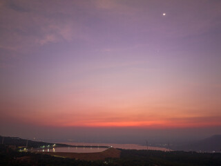 aerial view wind turbine viewpoint at Lamtakong dam,Nakhonratchasima, Thailand.
amazing sky of sunset above Lamtakong dam beautiful reflection on the large pond.
Gradient color. Sky texture, 