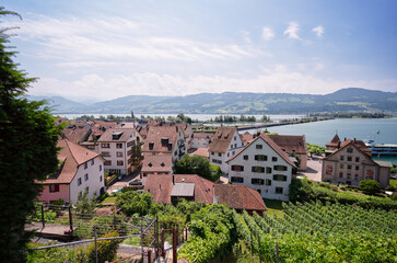Fototapeta na wymiar Tiled roofs of old town Rapperswil-Jona on Lake Zurich, Switzerland.
