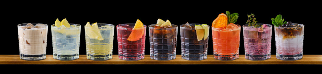 Set of cold refreshing drinks on black background