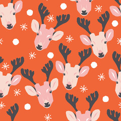 Obraz premium Vector seamless Christmas pattern with deers and snowflakes