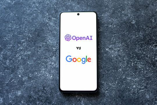 OpenAI ChatGPT bot vs Google on phone screen on concrete background, AI replacing Google concept. Swansea, UK - January 3, 2023.