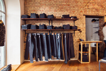 Jeans hanging in store