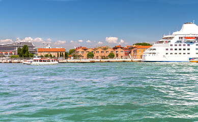 View of the sea city pier with a tourist cruise liner.