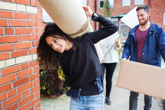 Women and man moving house