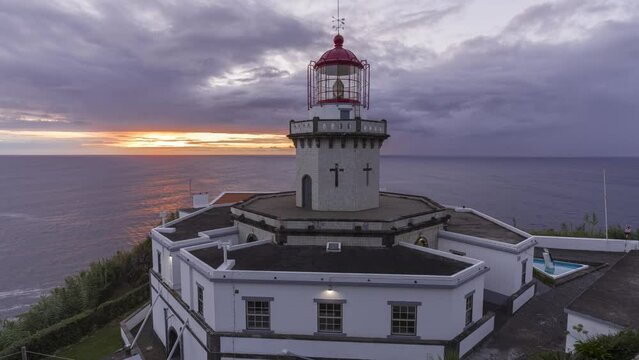 Sunrise at Farol do Arnel (Arnel Lighthouse) on Sao Miguel in the Azores Islands, Portugal, Atlantic