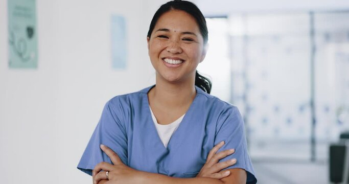 Nurse, face or arms crossed in hospital clinic with wellness motivation, medical research trust or surgery planning motivation. Portrait, smile or happy healthcare worker with confidence in Indonesia