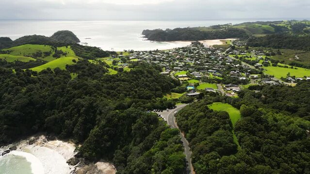 Matapouri township in Whale Bay in New Zealand, aerial drone view