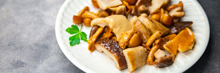 mushroom salad mix appetizer white mushroom, boletus mushroom, chanterelle mushroom, ready to eat healthy meal food snack on the table copy space food background rustic top view