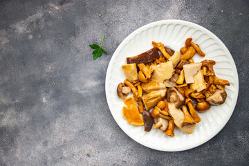 mushroom salad mix appetizer white mushroom, boletus mushroom, chanterelle mushroom, ready to eat...