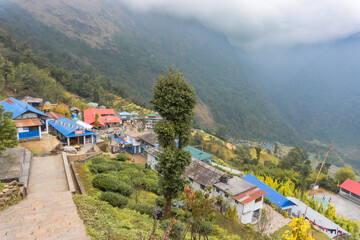 View of Chhomrong town, a little village in the middle of Annapurna Base Camp trek, in the Himalayan Mountain Range in Nepal, with its characteristic lodges for trekkers