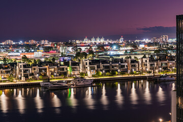 Yarra River and real estate buildings at night