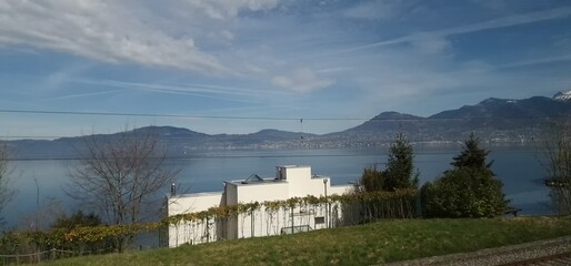 Fototapeta na wymiar Lake Geneva le Léman deep lake on the north side of the Alps, shared between Switzerland and France. It is one of the largest lakes in Western Europe and the largest on the course of the Rhône 