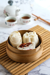 baakpau daging or meat steam bun
