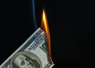 100 dollar bill fire burning cash