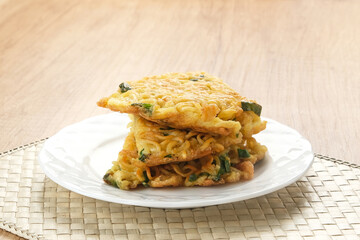 Martabak Mie, made from noodles mixed with eggs, leeks then fried. Indonesian food
