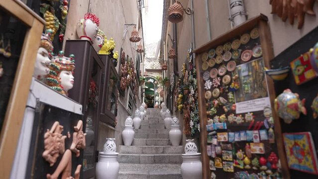 Souvenirs and pottery in narrow street in Taormina, Taormina, Messina, Sicily, Italy, Mediterranean, Europe
