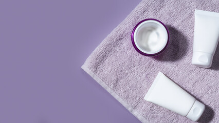 Natural organic eco-cosmetics. Beauty SPA branding mockup. Cosmetic containers with cream and lotion, on color background flat top view. Blank label for branding