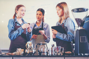 Group woman people leaning and education workshop for classes barista coffee in cafe room.  Preparing teacher meeting and training service about hospitality and make coffee.  Education Concept
