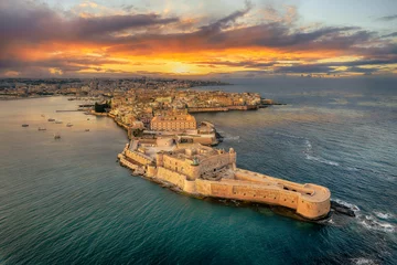 Fototapeten Landscape with Syracuse at sunset, Sicily islands, Italy © Serenity-H