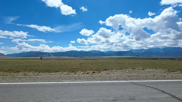 Road trip. Car view for scenic road Chuyskiy Trakt.