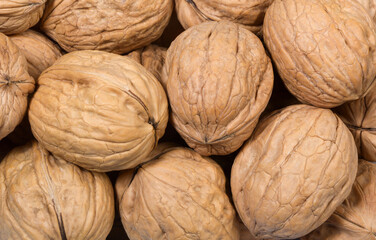 Whole walnuts as background