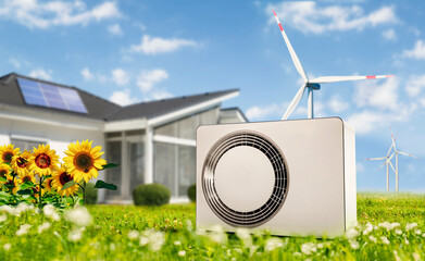 Heat pump with house, photovoltaic and wind power for renewable energy - 585790963