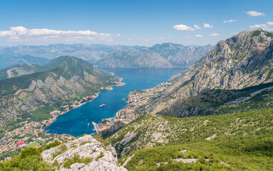 Fototapeta na wymiar Aerial view of Kotor Bay, Montenegro. Bright sunny day, blue sky.