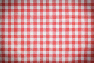 Red and white tablecloth as background, vignette effect