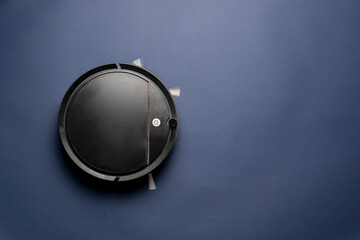 top view of black robot vacuum cleaner isolated, new technology machine