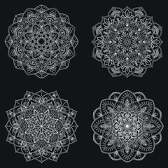 Collection of white mandalas isolated on a dark background. Vintage decorative elements. Outline hand drawn. Vector illustration