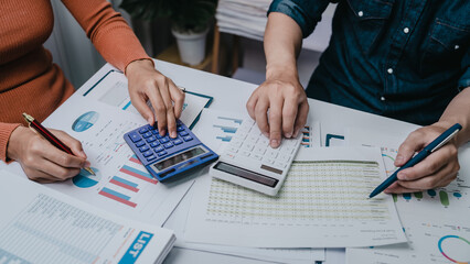 Business bookkeeping with calculator of bookkeeper and household calculating chart graph annual financial account.