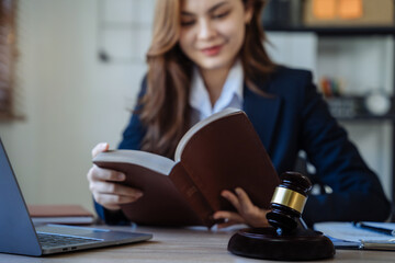 lawyer student is sitting at the reading table.
