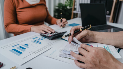 Business bookkeeping with calculator of bookkeeper and household calculating chart graph annual financial account.