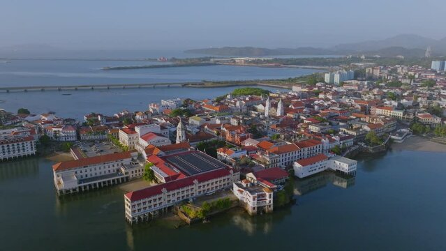 Drone sunrise shot of casco viejo, old town from Panama City near the ocean at sunrise 