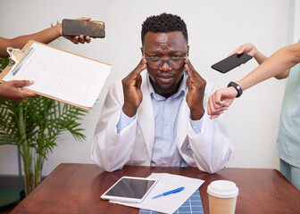 Stressed and overwhelmed doctor concept, priorities and healthcare workload