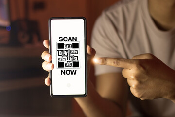 Hand touching smart phone login application system to scan qr code for business financial transaction and new modern technology
