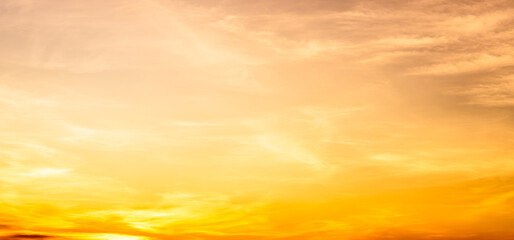 Naklejka na ściany i meble golden sunset sky with clouds
