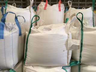 Chemical fertilizer The product stock is packed in sacks, stacked in the warehouse, waiting for...