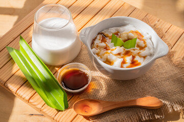 Porridge in a serving bowl. Marrow porridge is a kind of food in the form of white porridge made from rice flour. Authentic Indonesian food