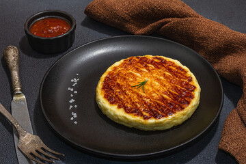 Grilled Halloumi cheese served on plate. Cutlery, traditional food for picnic or BBQ