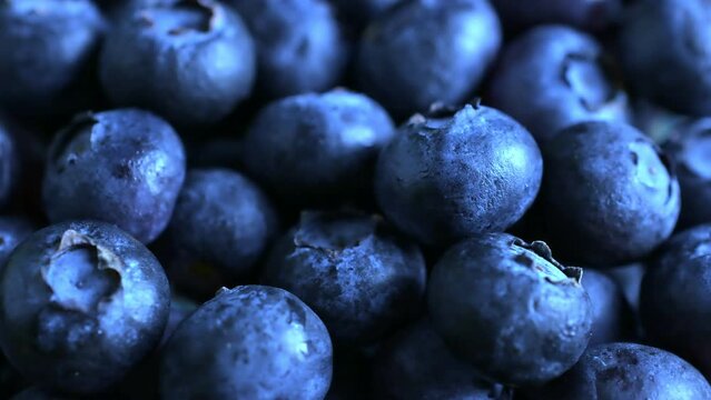 Experience the Sweetness of Blueberries in Close-Up.
