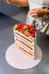 Colombian Pastry Chef. Detail of the interior of a professional multi-tiered cake.